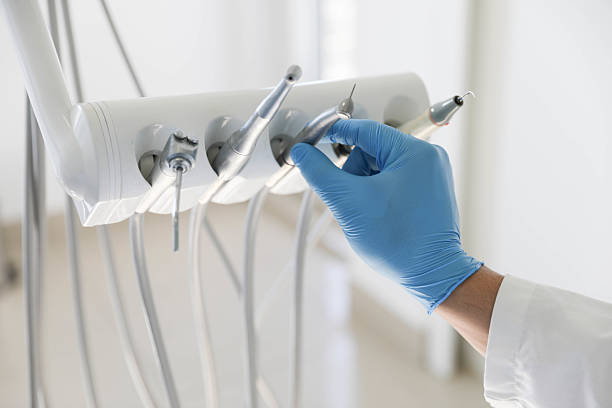 Professional Root Canal Treatment technician working in Piqua, OH